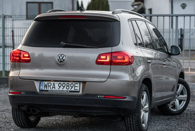 Volkswagen Tiguan cena 53700 przebieg: 299000, rok produkcji 2014 z Wojkowice małe 497
